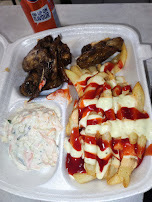 Grilled chicken wings with saucy cheese chips and creamy coleslaw